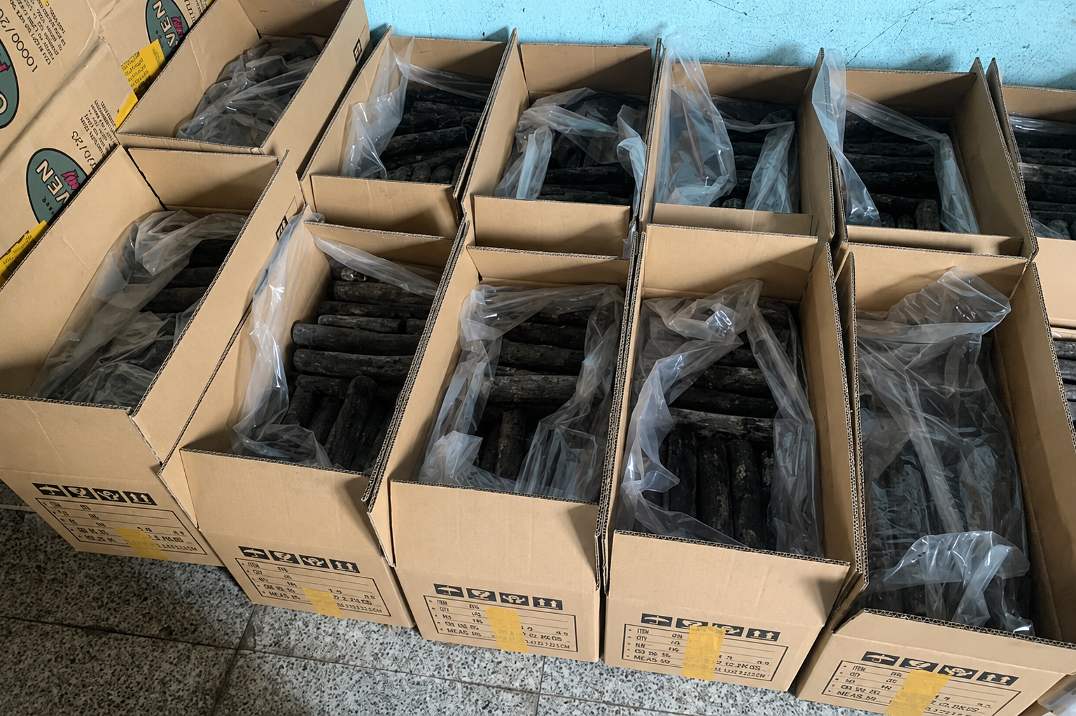 Charcoal packed into lined export cartons