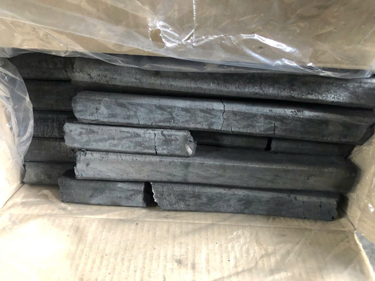 Sawdust Ogatan charcoal packed in a lined carton